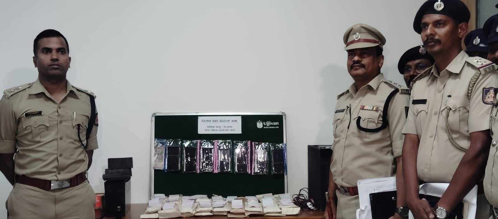 belgaum-news-police-busted-network-of-inter-state-fraudsters-who-were-defrauding-the-public-by-luring-them-with-money-in-gokak-of-the-district-202603_1.jpg | बेळगाव; 7 जणांना अटक; दोघे पोलीस; | belgaum news | belgavkar बेळगावकर